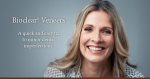 A woman smiling because BioClear is cost effective, quick and easy fix to minor dental imperfections