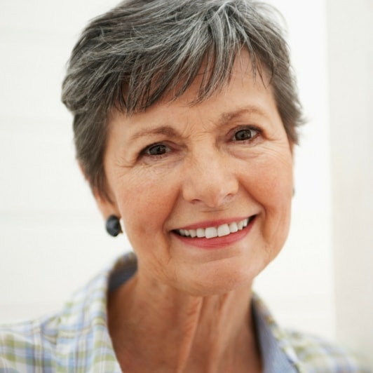 An older woman smiling