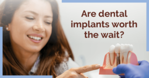 Woman pointing at implant model with "Are dental implants worth the wait?"